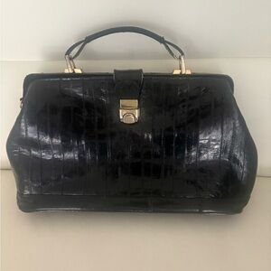 Elegant Vintage Black Eel Skin Handbag with Gold Accents